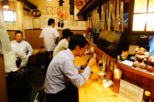 Locals in an izakaya (Ebisu district, Tokyo, Japan)