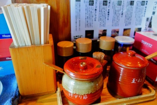 Ramen noodle shop table set-up (Tokyo, Japan)